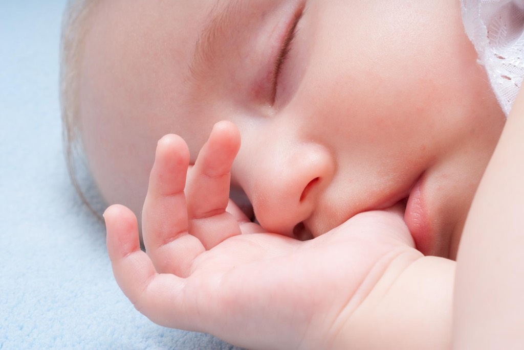 Baby Sleeping sucking thumb