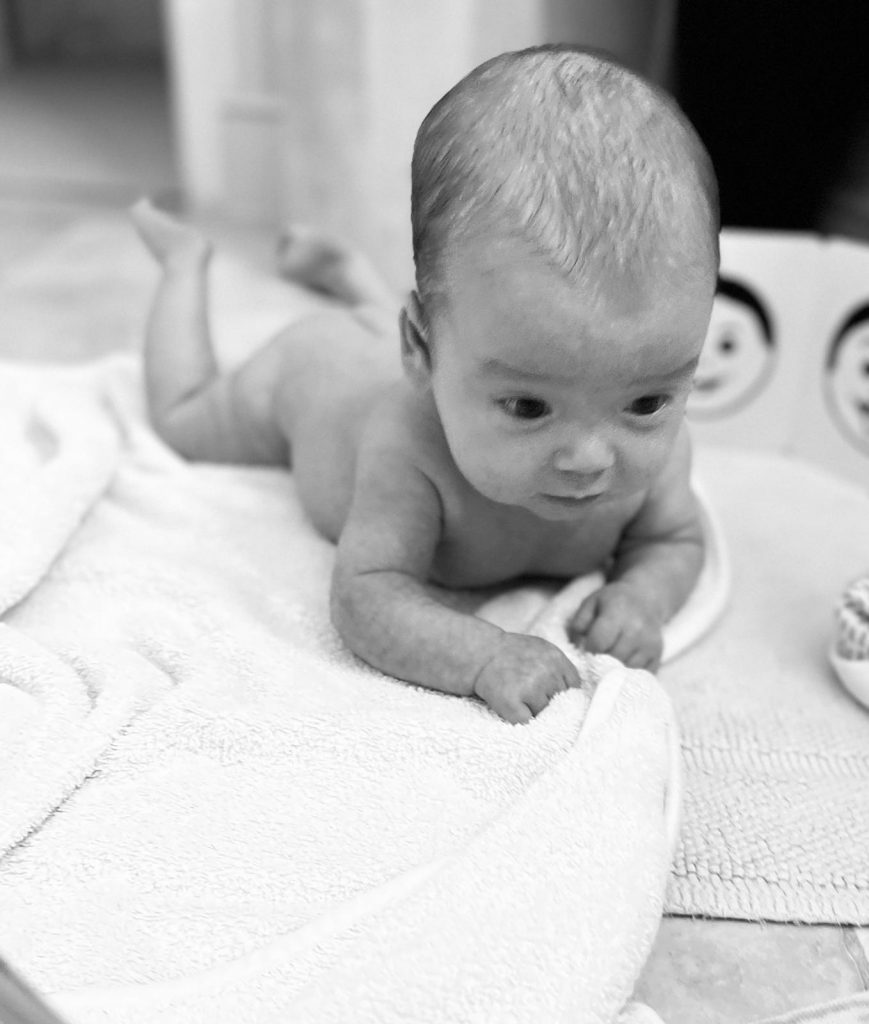 Newborn Baby lying on front